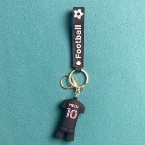 & Other Stories Black Football Jersey Keychain with Pink Details